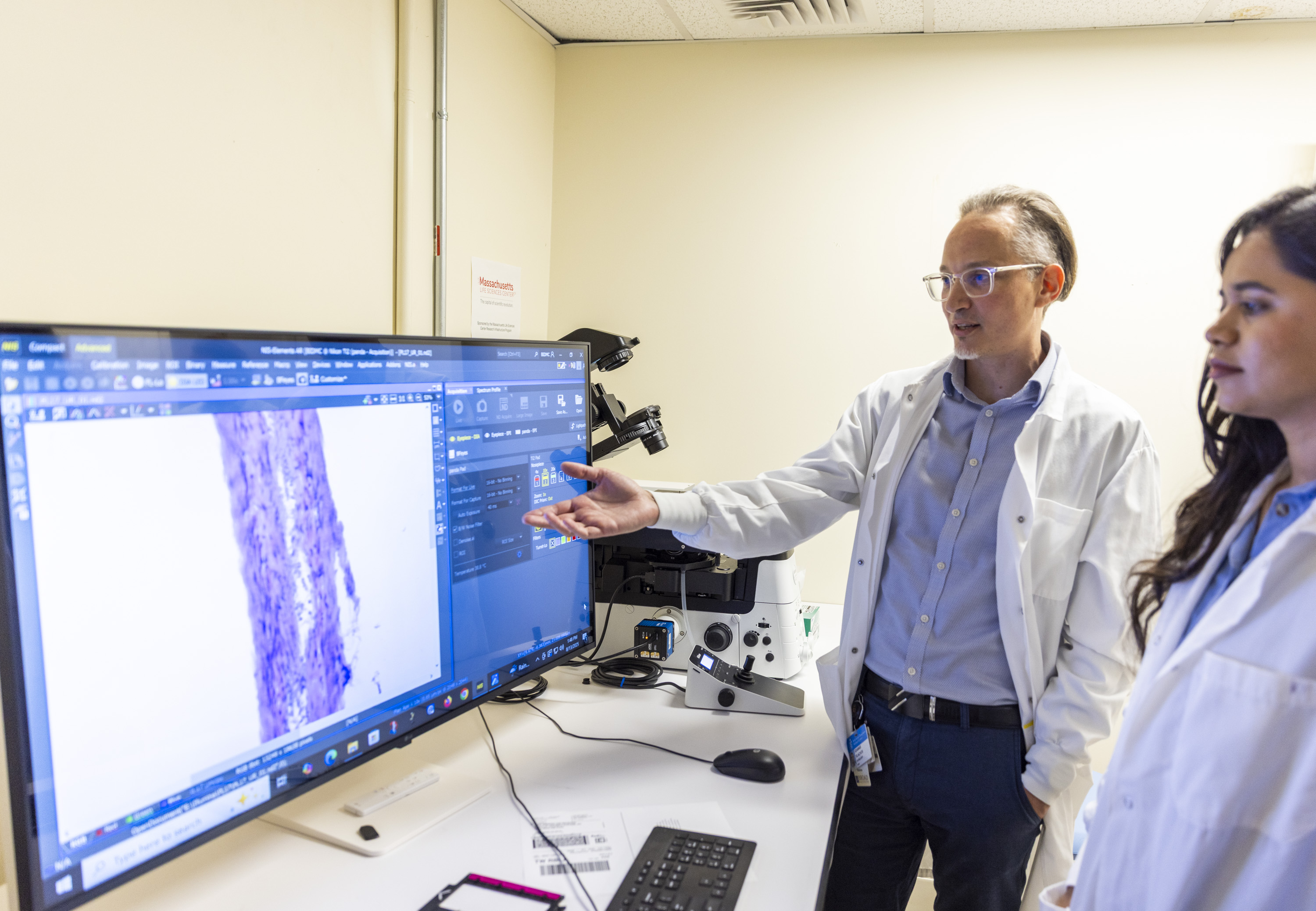 Spatial Technologies Unit scientists reviewing spatial data